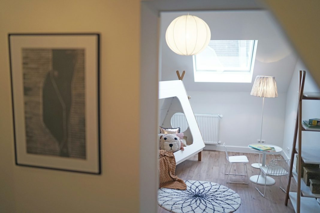 a room with a picture of a bear on the wall